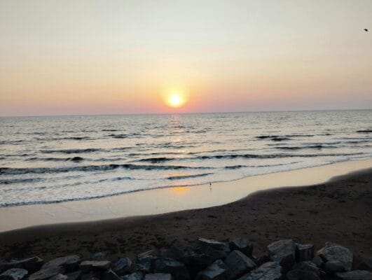 Beach sunset illustrating Melanotan II tanning peptide concept