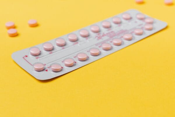 Blister pack of Diane-35 contraceptive pills on yellow background