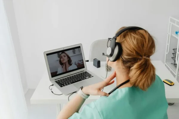 Patient on telehealth video call with doctor — ED medication guide
