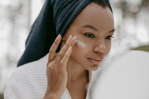 Woman applying face cream — Melalite Forte hydroquinone guide for melasma