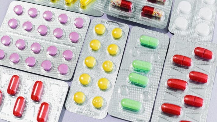 Diverse SSRI SNRI and dapoxetine medication tablets in blister packs representing the three classes used for premature ejaculation treatment
