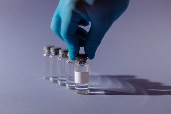 Pharmaceutical vial and syringe for testosterone ester injection